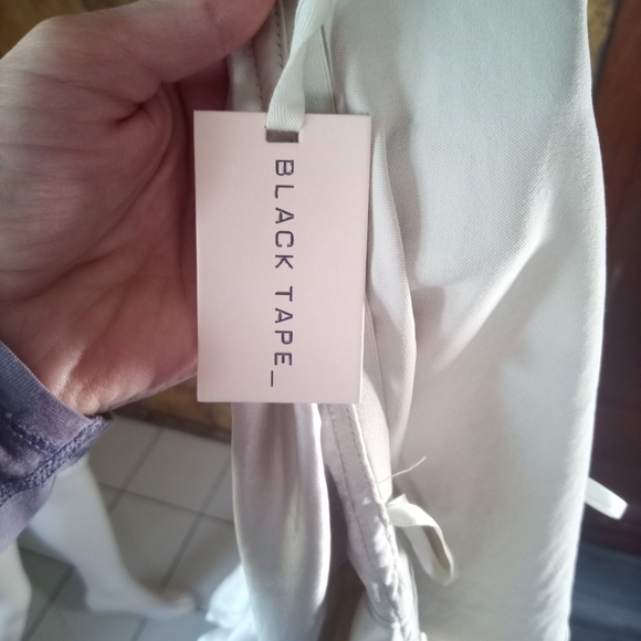 Black Tape_ Cream Strapless Top - Picture 2 of 4